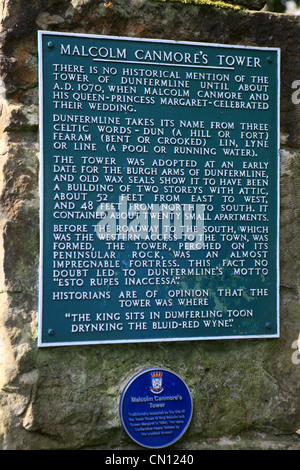 Information plaque at the location of Malcolm Canmore's Tower in Pittencrieff Park in Dunfermline, Fife Stock Photo