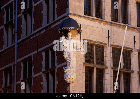 Statue of Madonna with child on a corner of the Market Place in Antwerp, Belgium Stock Photo