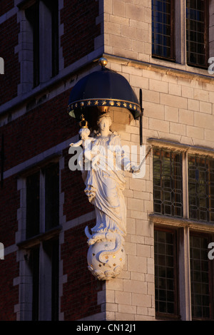 Statue of Madonna with child on a corner of the Market Place in Antwerp, Belgium Stock Photo