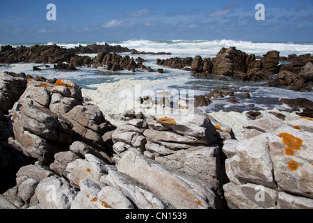 View of the rocks and where the Atlantic and indian Ocean's meet at the Southern tip of Africa, Cape L'Agulhas, South Africa Stock Photo