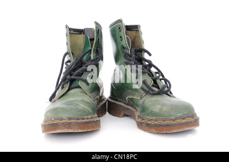 Pair of dirty green worn out shoes Stock Photo