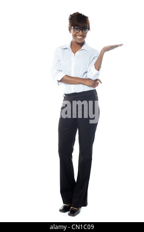 Female business executive posing with copyspace isolated against white Stock Photo