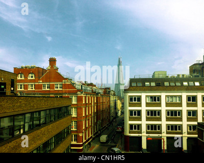 London England Street Scene View From Train Showing The Shard Under Construction Near Completion Stock Photo