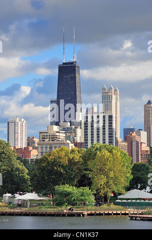 Chicago skyline with skyscrapers viewed from Lincoln Park over lake. Stock Photo