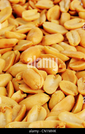 roasted and salted peanuts background Stock Photo
