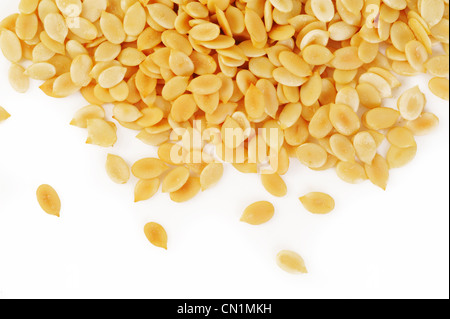 Roasted watermelon seeds with salt on white background Stock Photo