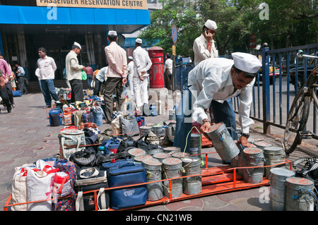 Dabbawalas at work Churchgate Station Mumbai Bombay India Stock Photo