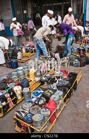 Dabbawalas at work Churchgate Station Mumbai Bombay India Stock Photo