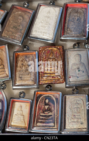 Thailand, Bangkok Amulet Market. Local religious amulets, charms, talismans & traditional medicines market. Stock Photo