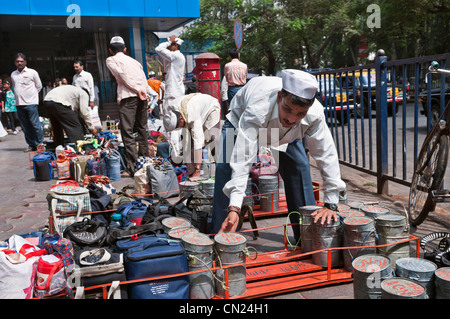 Dabbawalas at work Churchgate Station Mumbai Bombay India Stock Photo