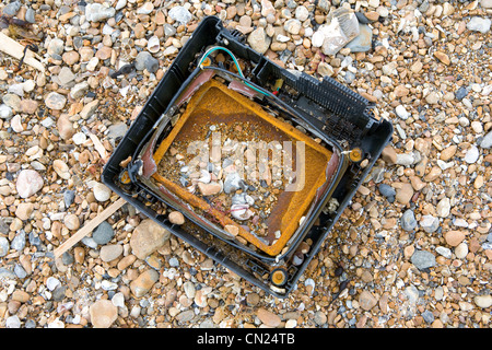 TV on pebble beach Stock Photo