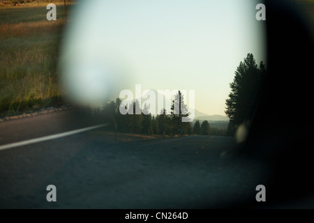 Mount Hood seen in car mirror, Portland, Oregon Stock Photo