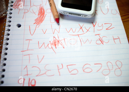 Child's writing on notepad Stock Photo