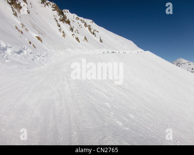 Skiers coming down hill, Utah, USA Stock Photo