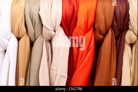 Multicolored scarves on display Stock Photo