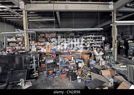 Industrial building sold in bankruptcy auction.  Unused for years, it was looted and vandalized. and occupied by squatters. Stock Photo