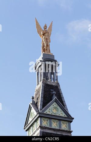 Angel statue representing Commerce and Industry on top of the Angel building at Paisley Road Toll, Glasgow, Scotland, UK Stock Photo