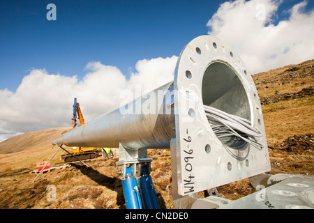 3 wind turbines being constructed behind the kirkstone Pass Inn on kirkstone Pass in the Lake District, UK. Stock Photo