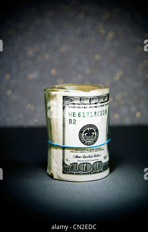 Roll of Hundred Dollar Bills Stock Photo