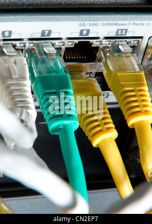network cables connected to hub Stock Photo