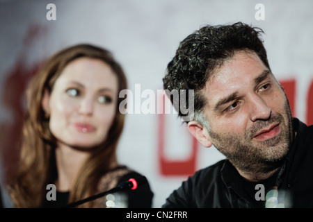 Bosnian film director and Oscar winner Danis Tanovic accompanied with US actress and film director Angelina Jolie addresses Stock Photo