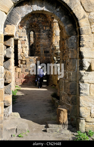 Stone archways in Kirkstall Abbey, ruins of Cistercian monastery, Leeds, West Yorkshire Stock Photo