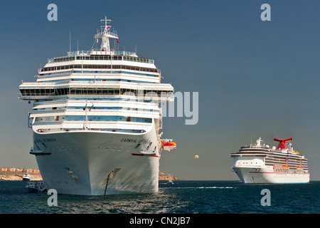 Carnival Splendor and Carnival Spirit cruise ships anchored in Sea of Cortez off Cabo San Lucas-Mexico. Stock Photo