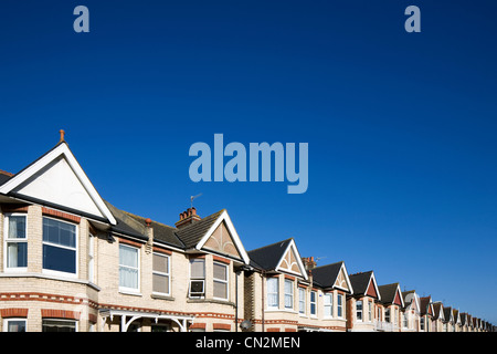 Street of houses and blue sky Stock Photo