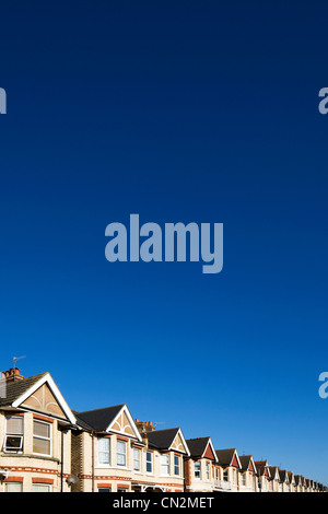 Street of houses and blue sky Stock Photo