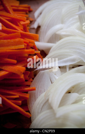 Freshly sliced carrots and onions Stock Photo