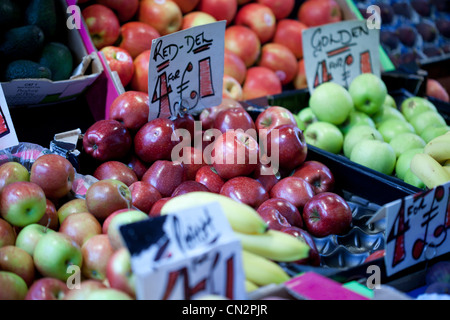 Fresh apples for sale on market stall Stock Photo