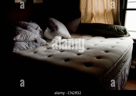 Unmade bed Stock Photo