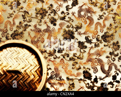 Bamboo steamer and chinese dragon pattern Stock Photo