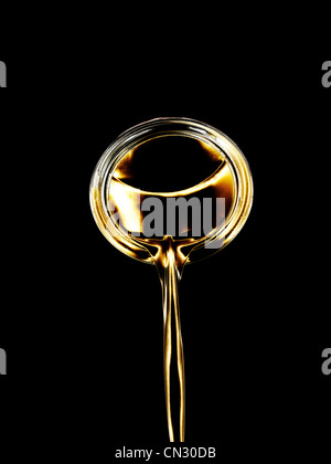 Pouring liquid gold hi-res stock photography and images - Alamy