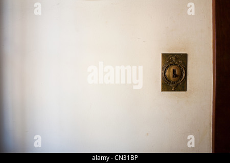 Old vintage metal electricity switch and junction box with exposed conduit  pipes on the surface mounted on a wooden wall alongside a door Stock Photo  - Alamy