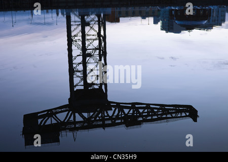 Scotland, Glasgow, Clydebank, Reflection of The Finneston Crane in the River Clyde Stock Photo