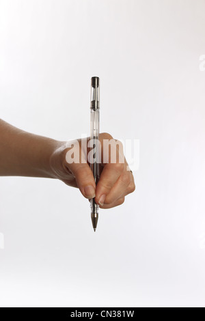 close up of a hand holding a pen Stock Photo