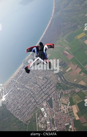 Wingsuit flying over Empuriabrava, Spain Stock Photo