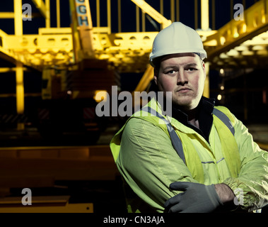 Portrait of builder on construction site Stock Photo