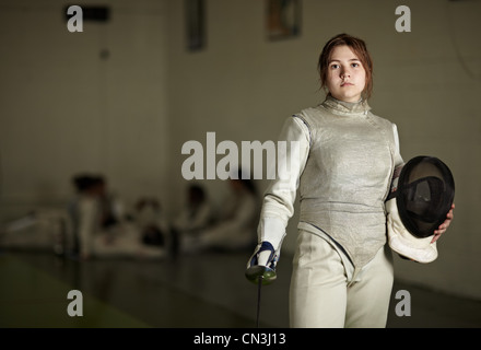 Portrait of teenage female fencer Stock Photo