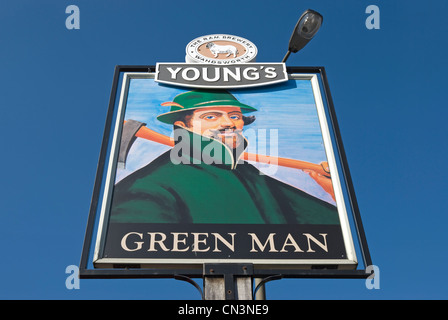 green man pub sign, with young's ram brewery logo, in putney, southwest london, england Stock Photo