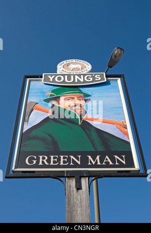 green man pub sign, with young's ram brewery logo, in putney, southwest london, england Stock Photo