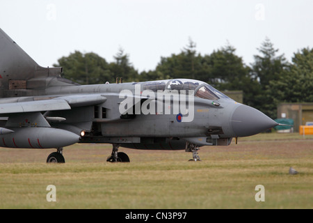Panavia Tornado GR4 (ZA458) is a variable geometry, two-seat, day or night, all-weather attack aircraft, capable of delivering a wide variety of weapons. Two RR RB199 Mk103 turbofan, Max speed: 1.3Mach, Max altitude: 50,000ft, Aircrew: 2 Armament: Storm Shadow, DMS and Legacy Brimstone, ALARM Mk 2, AIM-9L Sidewinder, Paveway II, Paveway III, Enhanced Paveway, Paveway IV, Mauser 27mm Cannon, ASRAAM Stock Photo