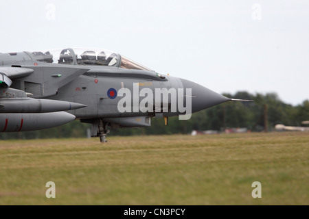 Panavia Tornado GR4 (ZA458) is a variable geometry, two-seat, day or night, all-weather attack aircraft, capable of delivering a wide variety of weapons. Two RR RB199 Mk103 turbofan, Max speed: 1.3Mach, Max altitude: 50,000ft, Aircrew: 2 Armament: Storm Shadow, DMS and Legacy Brimstone, ALARM Mk 2, AIM-9L Sidewinder, Paveway II, Paveway III, Enhanced Paveway, Paveway IV, Mauser 27mm Cannon, ASRAAM Stock Photo