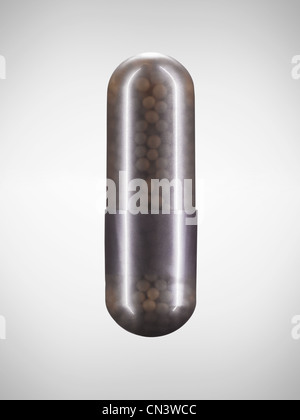 Capsule of small pills Stock Photo