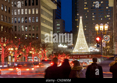 Canada, Quebec province, Montreal, decorations and Christmas lights, avenue McGill College, at background place Villemarie, Stock Photo