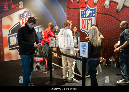 Football fans at the 'NFL at Draft' pop-up shop in Midtown Manhattan in New York Stock Photo