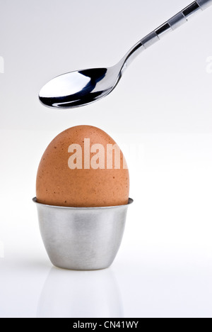 Egg cup and spoon. Stock Photo