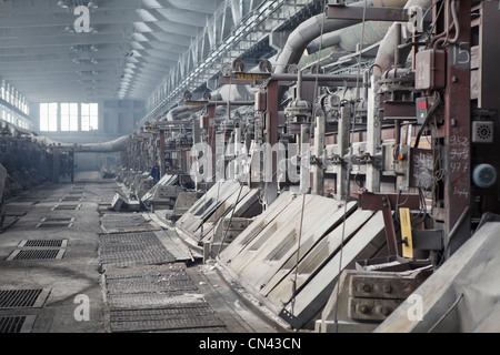 Aluminum metallurgical plant with electrolytic bathes. Non-ferrous Russian metallurgy. Dust in shop Stock Photo