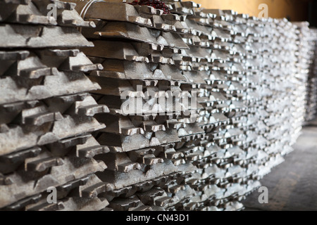 Aluminum bricks on non-ferrous metallurgical plant. Russian metallurgy factory. Perspective view Stock Photo